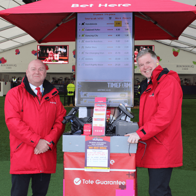 Members of the britbet team on a pool pitch at the Aintree Grand National